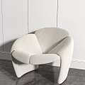 Modern Light Colored Fabric Lounge Chair With Curved Design For Interior Decor