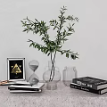 Home Decor Ornament Set with Green Foliage Clear Vase Hourglass Triangle Frame Stacked Books