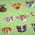Colorful Cartoon Animal Heads Collection with Various Animals on Green Background