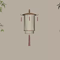 Traditional Chinese Lantern with Cream Shade and Red Tassels Hanging on Wall with Bamboo Leaves