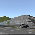 Modern Industrial Factory Building Exterior With Lakefront Greenery Trees And Landscaping