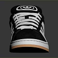 Black Low Top Sneaker With White Laces Logo And Orange Sole Edge