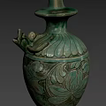 Teal Green Ceramic Vase With Intricate Carved Floral Patterns Decorative Handle And Classic Shape