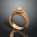Elegant Gold Fashion Ring With Central Gemstone And Intricate Filigree Band Design