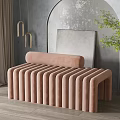 Pink Upholstered Sofa Bench with Ribbed Design in Modern Room Gray Wall Arched Decor and Potted Plant