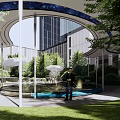 Modern Garden Landscape with Fountains Green Plants White Pergola Modern Buildings and Lawn