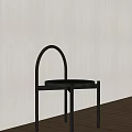 Black Console Table With Arched Metal Frame And Round Top In Minimalist Design