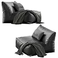 Stylish Modern Black Leather Single Sofa With Decorative Pillow And Cozy Blanket