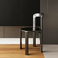 Modern Single Chair Interior Design With Sleek Metal Frame And Black Seat