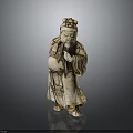 Ancient Robed Figurine Statue With Crowned Head And Carved Traditional Design On Reflective Surface