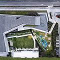 Modern Sales Center With Glass Curtain Wall Sloped Roof And Water Reflection