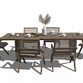 Wooden Dining Table Set with Six Wicker Back Chairs and Dried Plant Vase