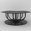 Black Modern Coffee Table With Curved Legs And Round Base Design