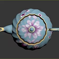 Blue Teapot With Pink Floral Patterns And Gold Accents On Lid And Handle