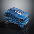 Blue Denim Jeans Stacked Folded With Brand Tag Fashion Apparel Item