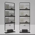 Modern Bookshelf With Black Frame And Transparent Shelves Holding Books
