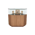 Jewelry Display Case with Glass Top and Wooden Cabinet Featuring Black Mannequins and Decorative Object