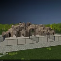 Scenic Park Landscape Featuring Stone Built Cave Like Structure Green Lawns Trees And Metal Fence
