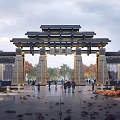Traditional Chinese Entrance Gate With Multi Tiered Roof And Ornate Pillars Surrounded By Autumn Trees