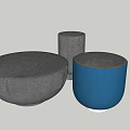 Round Gray And Blue Textured Upholstered Ottomans For Modern Living Room