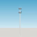 Tall Industrial Communication Tower With Antennas Under Blue Sky And Clouds