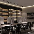 Modern Public Office Space With Multiple Computer Monitors Long Desk Black Chairs And Bookshelves