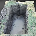 Dug Hole in Grass Area with Water Accumulated at Bottom and Dirt Edges