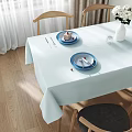 Bright Sunlit Minimalist Dining Room With Natural Wood Chairs And Soft Light Blue Tablecloth