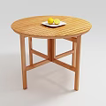 Round Wooden Coffee Table With Striped Tabletop And Plate Of Lemons On Top