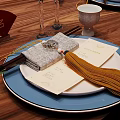 Elegant Round Dining Table Set With Matching Chairs Tableware Vase And Fresh Flowers
