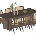 Wooden Dining Table Set with Woven Back Chairs Flower Vase and Fruit Bowl