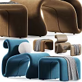 Modern Curved Lounge Chairs In White Brown Blue With Throw Blankets And Ottoman