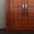Elegant Wooden Double Doors With Carved Panels And Wing Shaped Handles 3d model