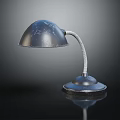 Vintage Industrial Metal Table Lamp Design With Curved Arm And Round Scratched Base