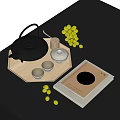 Elegant Tea Set with Black Teapot White Teacups on Wooden Tray and Green Grapes