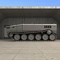 Large Tracked Utility Vehicle with Overland 1001 Marking Parked in Hangar Area