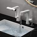 Modern Bathroom Faucet with Water Flowing from White Sink on Black Countertop and Sleek Design