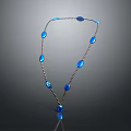 Elegant Blue Gemstone Necklace With Metallic Chain And Teardrop Pendants