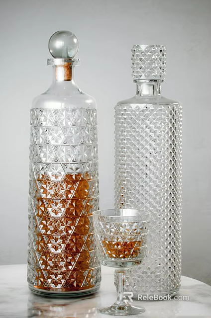 Two Elegant Transparent Patterned Wine Bottles With Brown Liquid And Small Glass Cup 3d model 