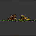 Two Frogs Of Different Colors Brown And Yellow Sitting On Green Grass