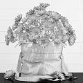 Fresh Yellow Sunflowers in Burlap Sack Vase Against White Brick Wall