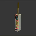 Vintage Mobile Phone With White Body Long Antenna Numeric Keypad And Bulky Retro Design