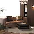 Brown Double Sofa With Decorative Pillows On Light Rug And Round Coffee Table