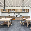 Contemporary Book Art Studio Design With Wooden Worktables And Illustration Tools