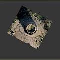 Ancient Stone Cylindrical Tower With Earth Toned Exterior Sandy Base And Green Vegetation