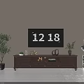 Wooden TV Stand in Living Room with TV Screen Potted Plants and Decorative Items