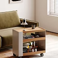 Wooden Side Table With Table Lamp Mug Books And Wine Bottles By Green Sofa