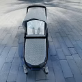 Modern Gray Patterned Stroller With Black Frame On Outdoor Paved Ground
