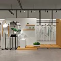 Modern Clothing Store Interior With Fashion Apparel Hanging Racks Mannequins Wooden Shelves And Plants