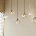 Modern Glass Pendant Lights Hanging In Indoor Room With Window Blinds